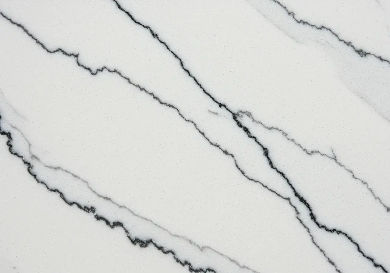 Calacatta marble effect quartz countertop in modern kitchen — luxury surface
