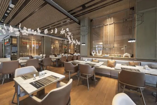 Restaurant dining furniture and interior — styled setting by AIKON, Cyprus contract & FF&E supply